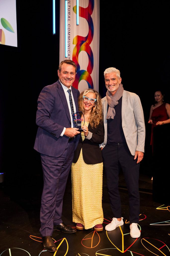 Rosanna Barbero and Craig Foster accept the NSW Premier’s Multicultural Communications Award for 'Die. Or Die Trying: Escaping the Taliban' from Stephen Kamper, NSW Minister for Multiculturalism. 24 August 2023.